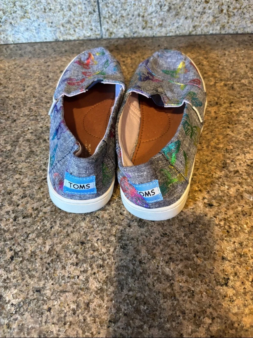 TOMS Gray Slip-On Shoes with Multicolor Butterfly Accents